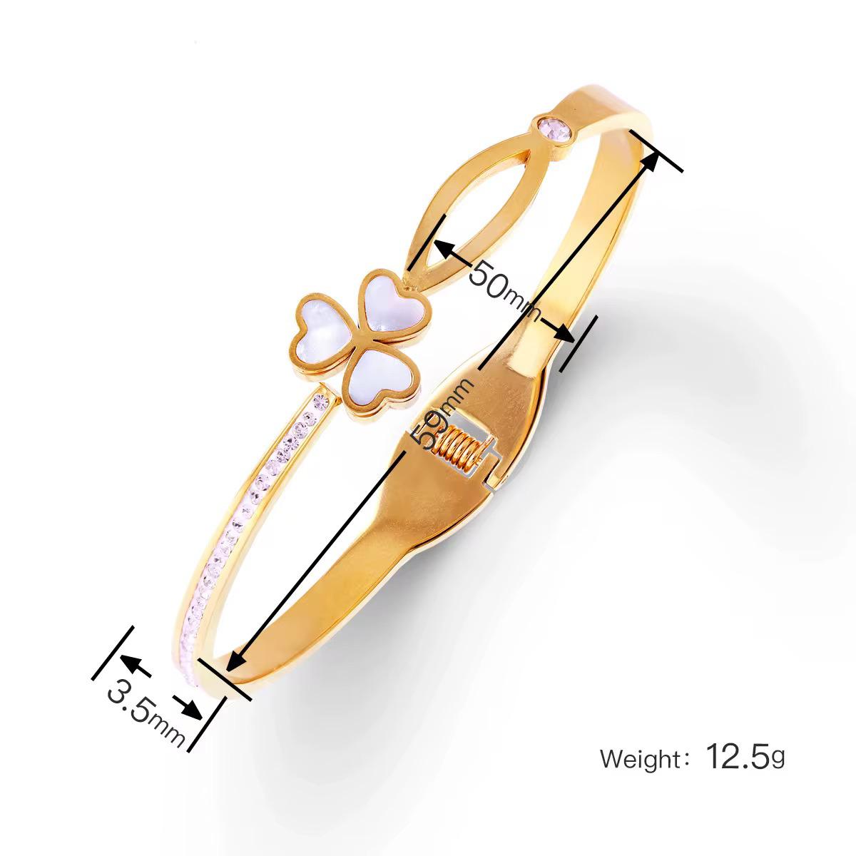 Elegant Lucky Clover Bangle, meticulously crafted in high-quality gold-plated material and adorned with sparkling zircons.
