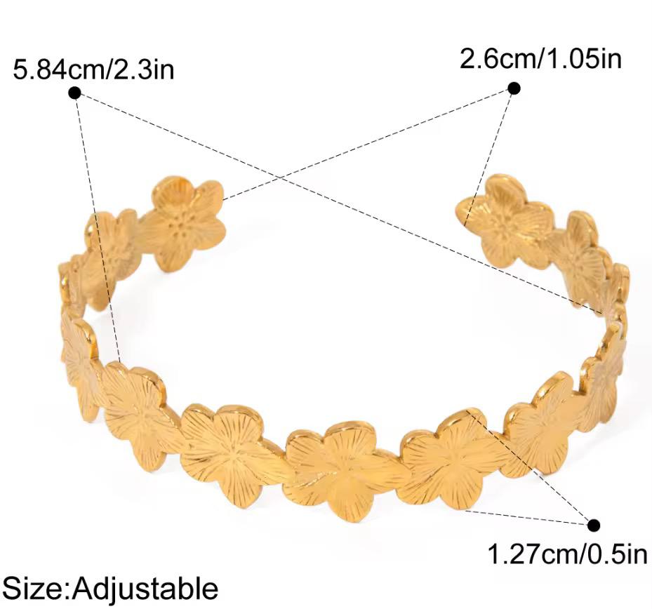 Embrace elegance with this floral-inspired gold bracelet,